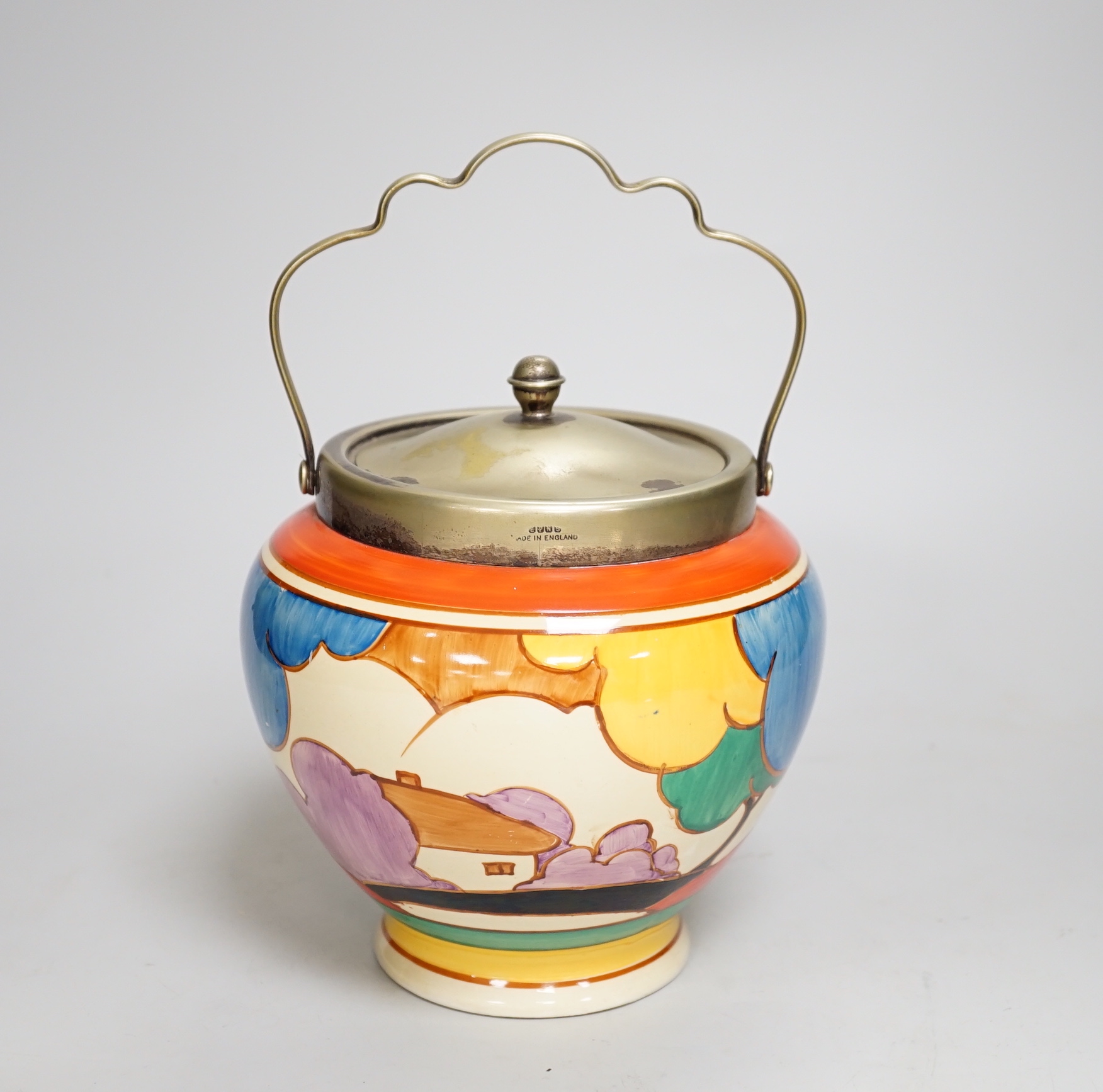 A Clarice Cliff biscuit jar, Blue Autumn, c.1931 with silver plated lid and swing handle, 21cm high